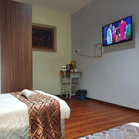 Oyo 90964 Melody 88 Inn Miri Kültér fotó