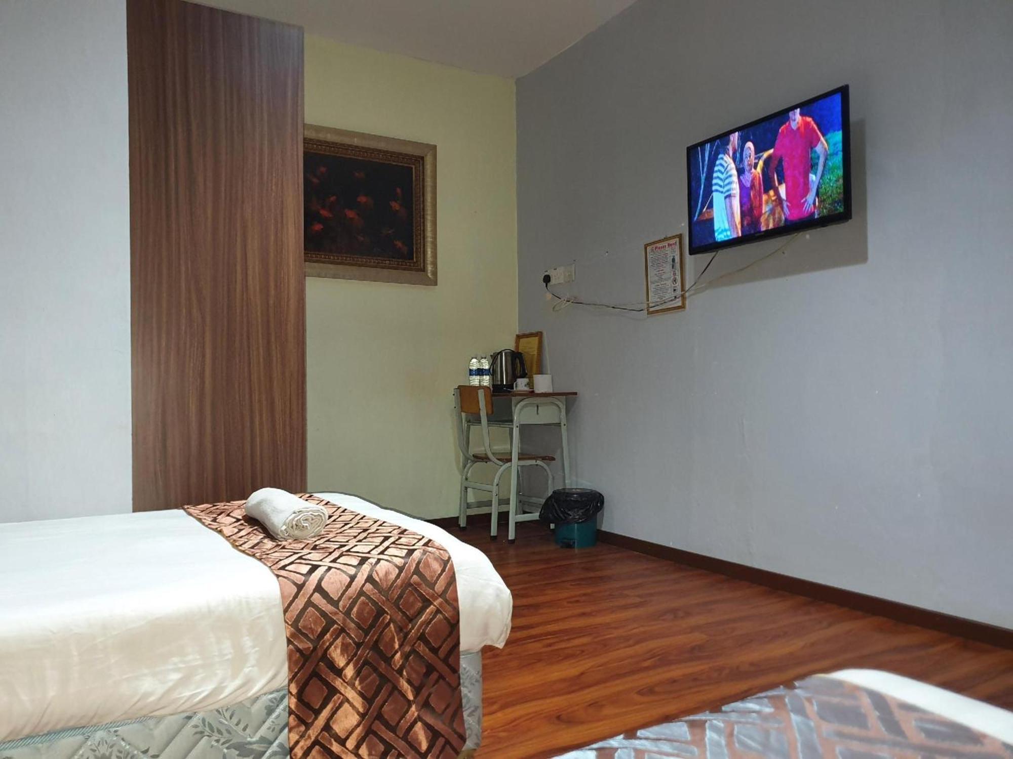 Oyo 90964 Melody 88 Inn Miri Kültér fotó